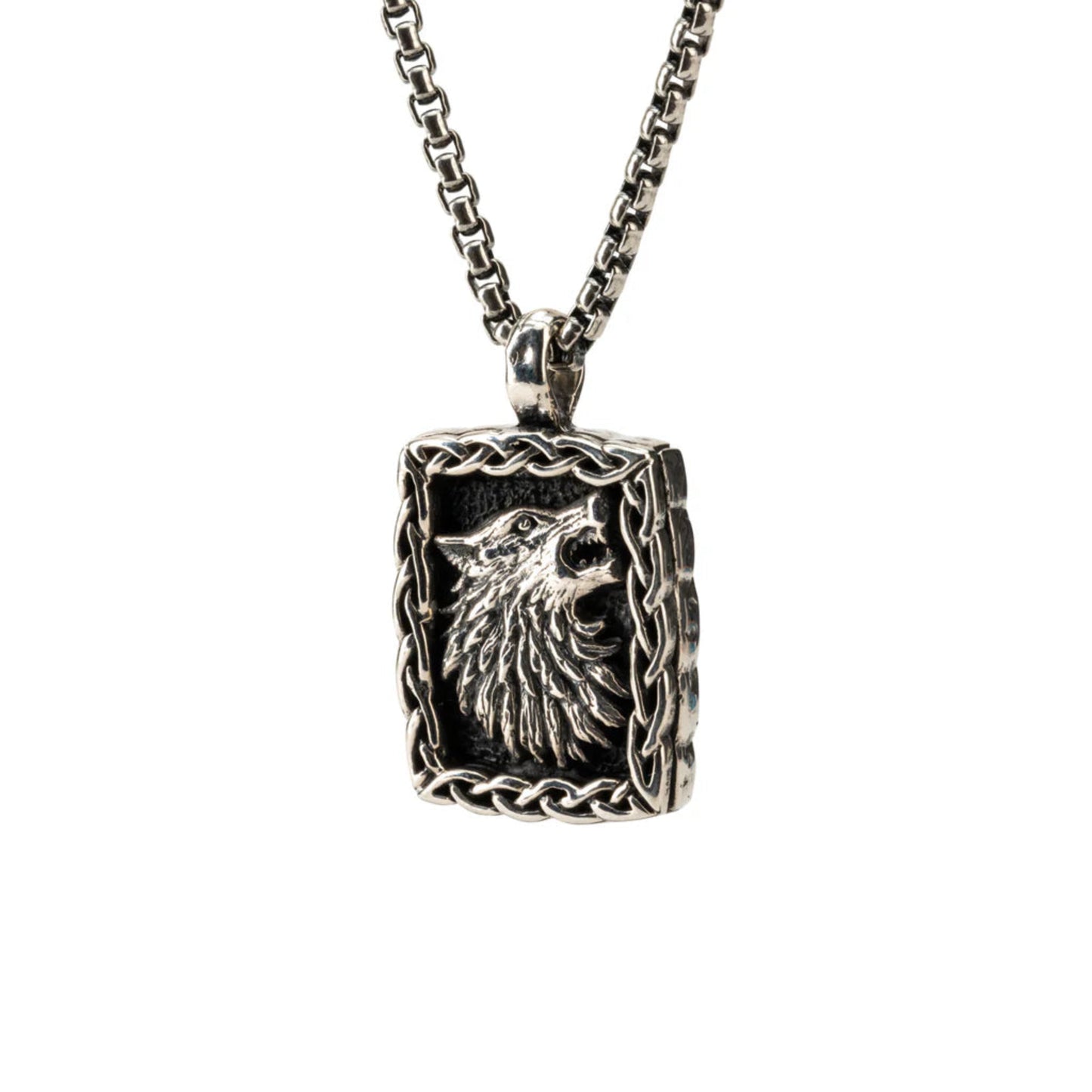 An oxidized silver wolf pendant with a Venetian style chain.