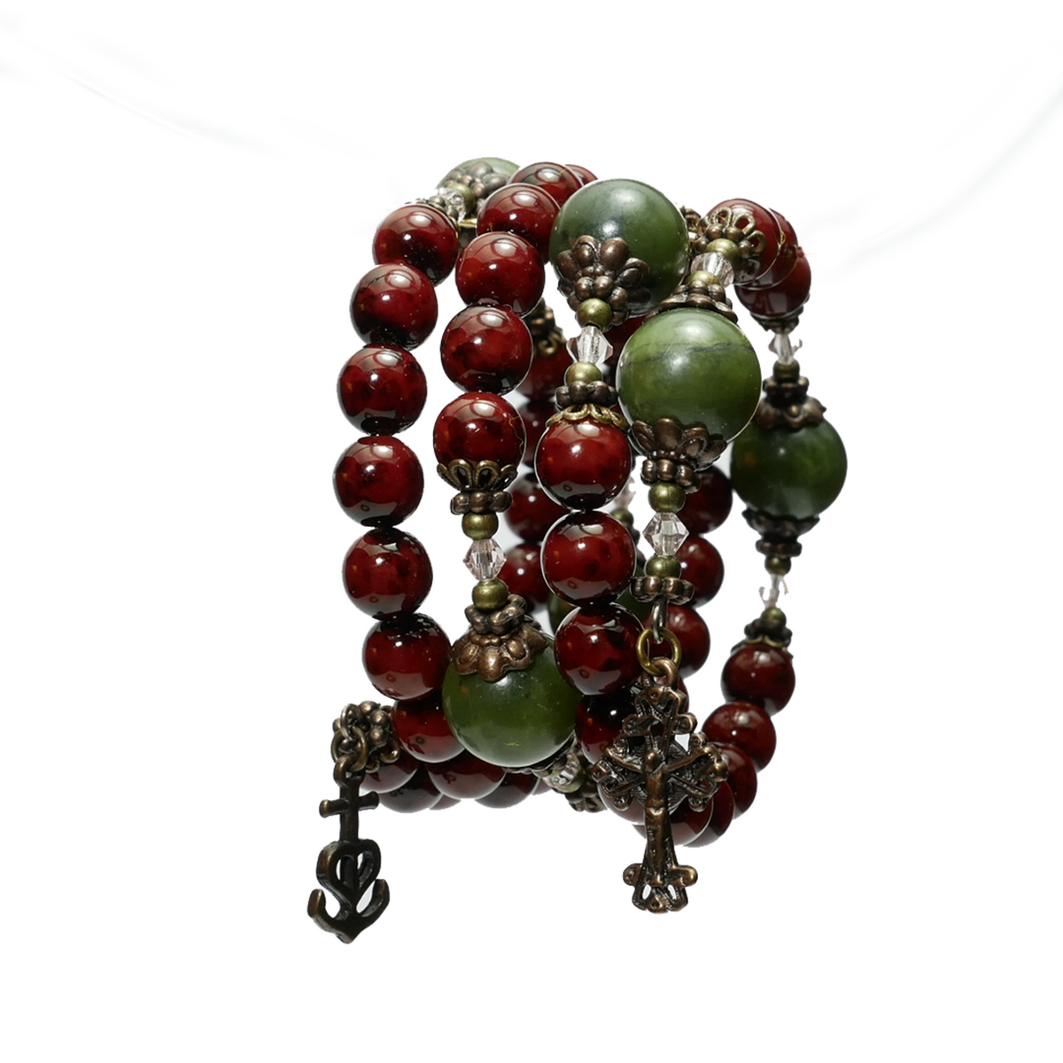 Beaded bracelet with red and green beads on a white background