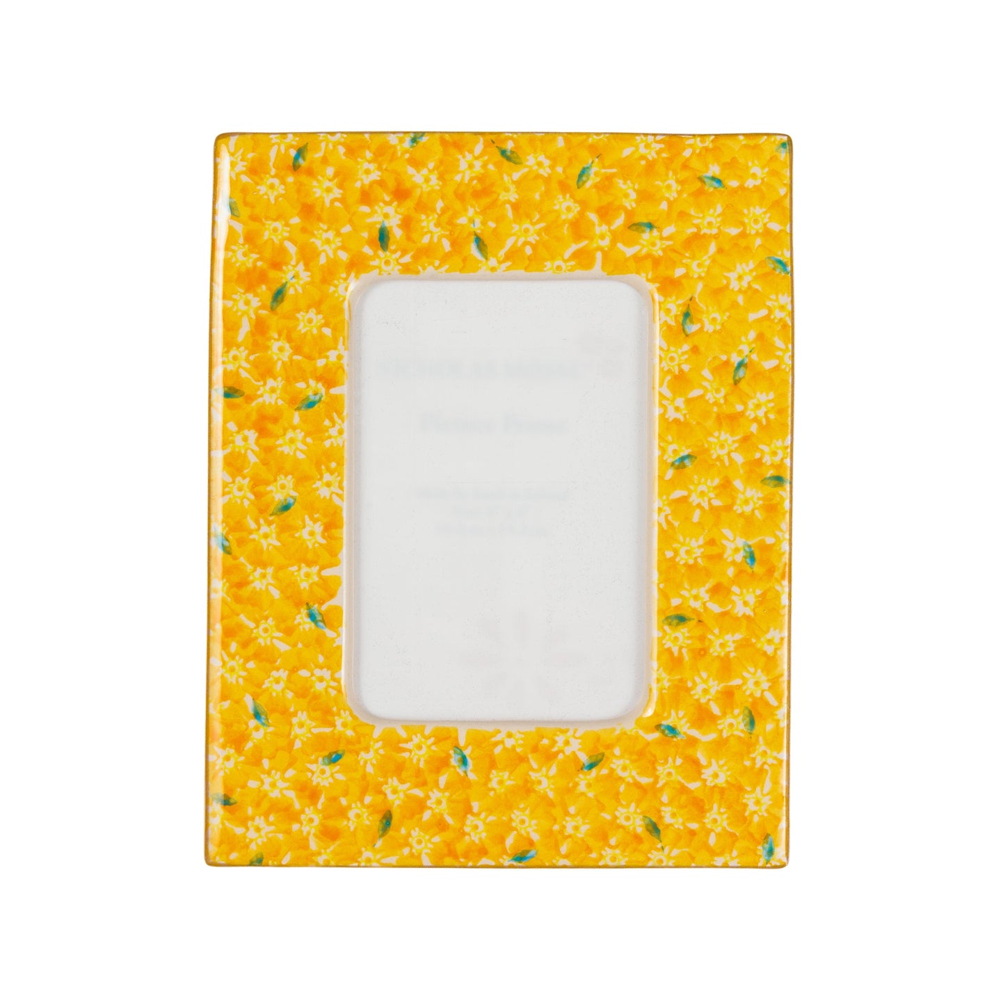 A rectangular picture frame with a yellow border featuring an all-over floral pattern and a clear glass front.