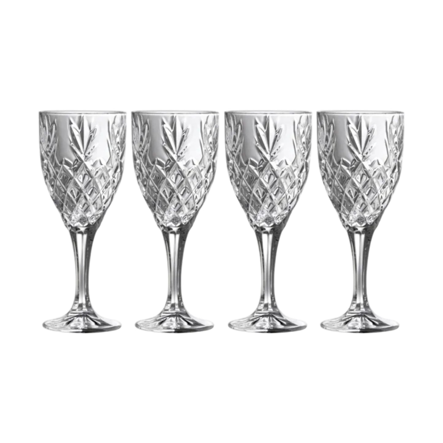Four crystal wine glasses with cut patterns on a white background