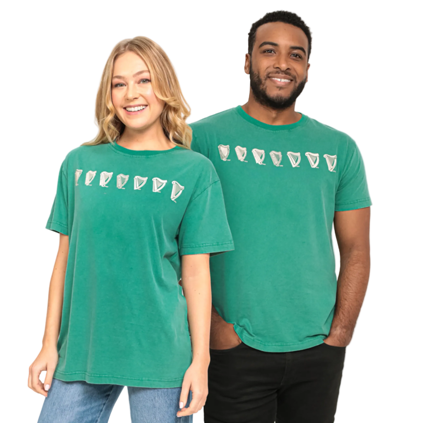 A man and woman wearing green shirts with white harp designs on the front.