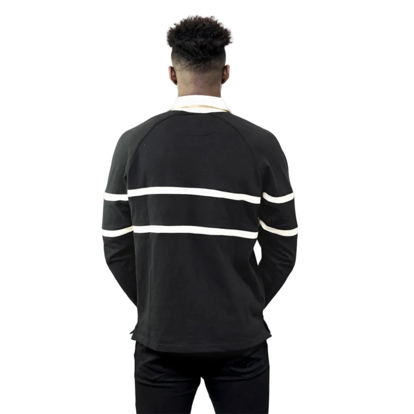 A man showing the back of a black rugby shirt with cream-colored stripes and a cream-colored collar.