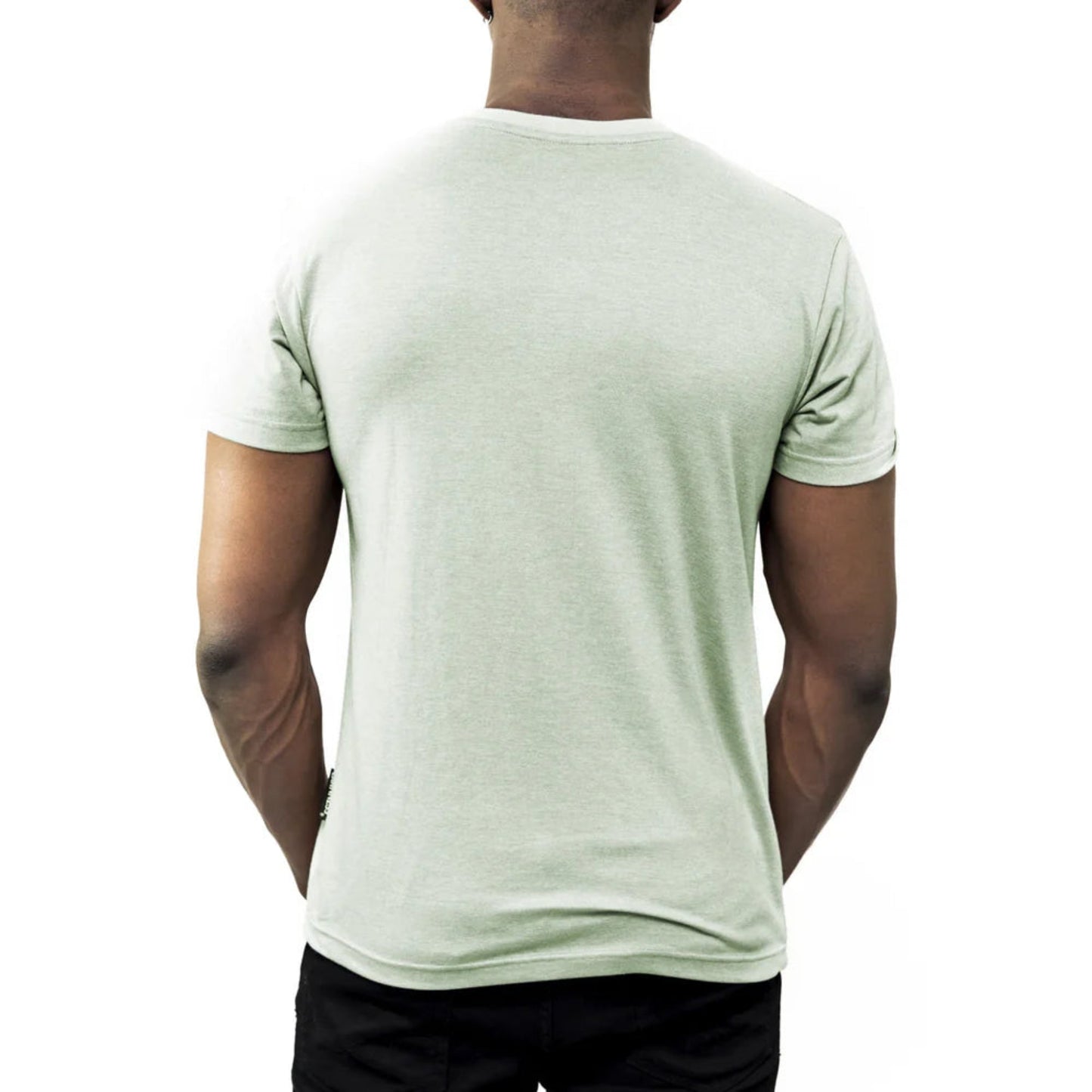 A man turned around to show the back of his light green tee shirt.