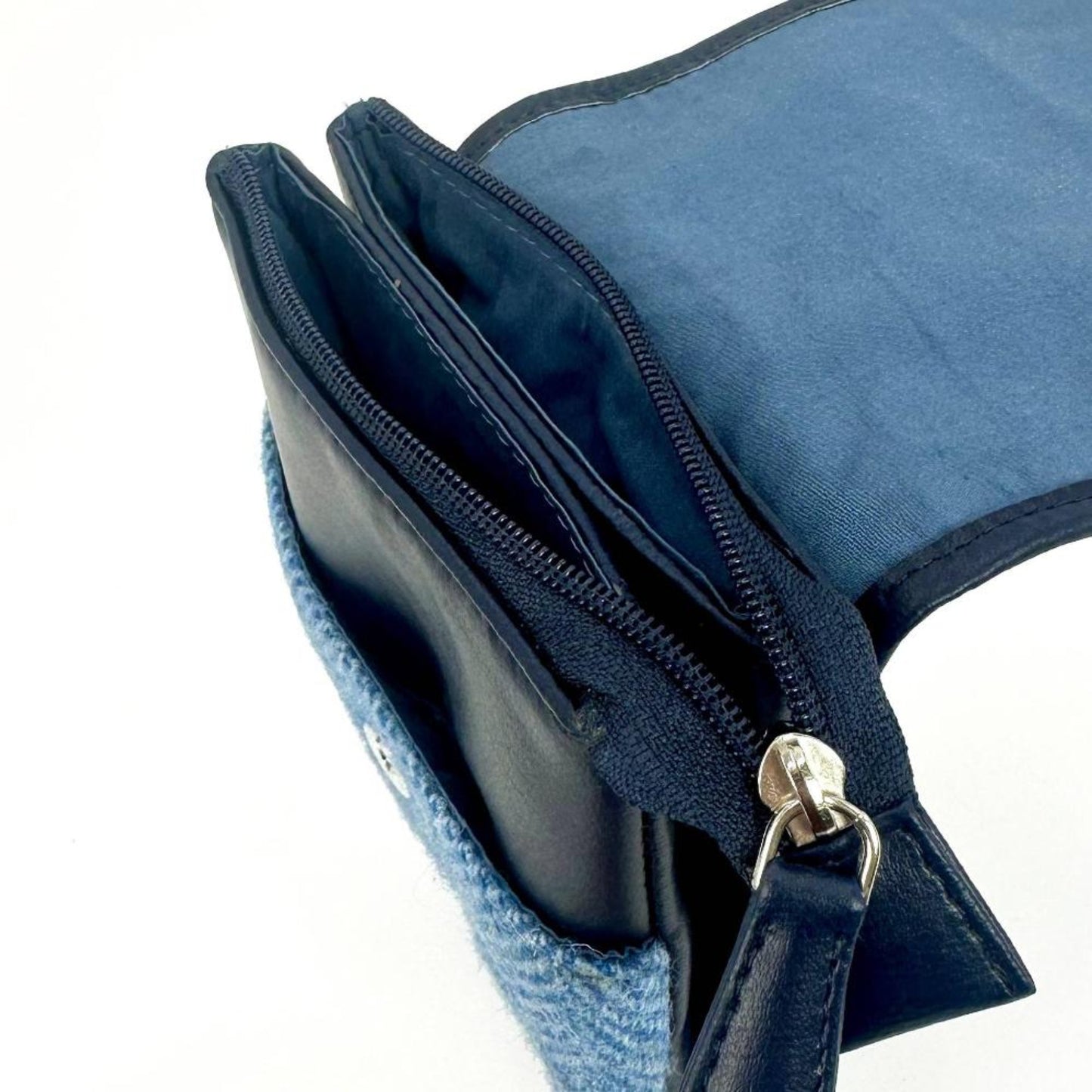 Blue bag with a zipper on a white background