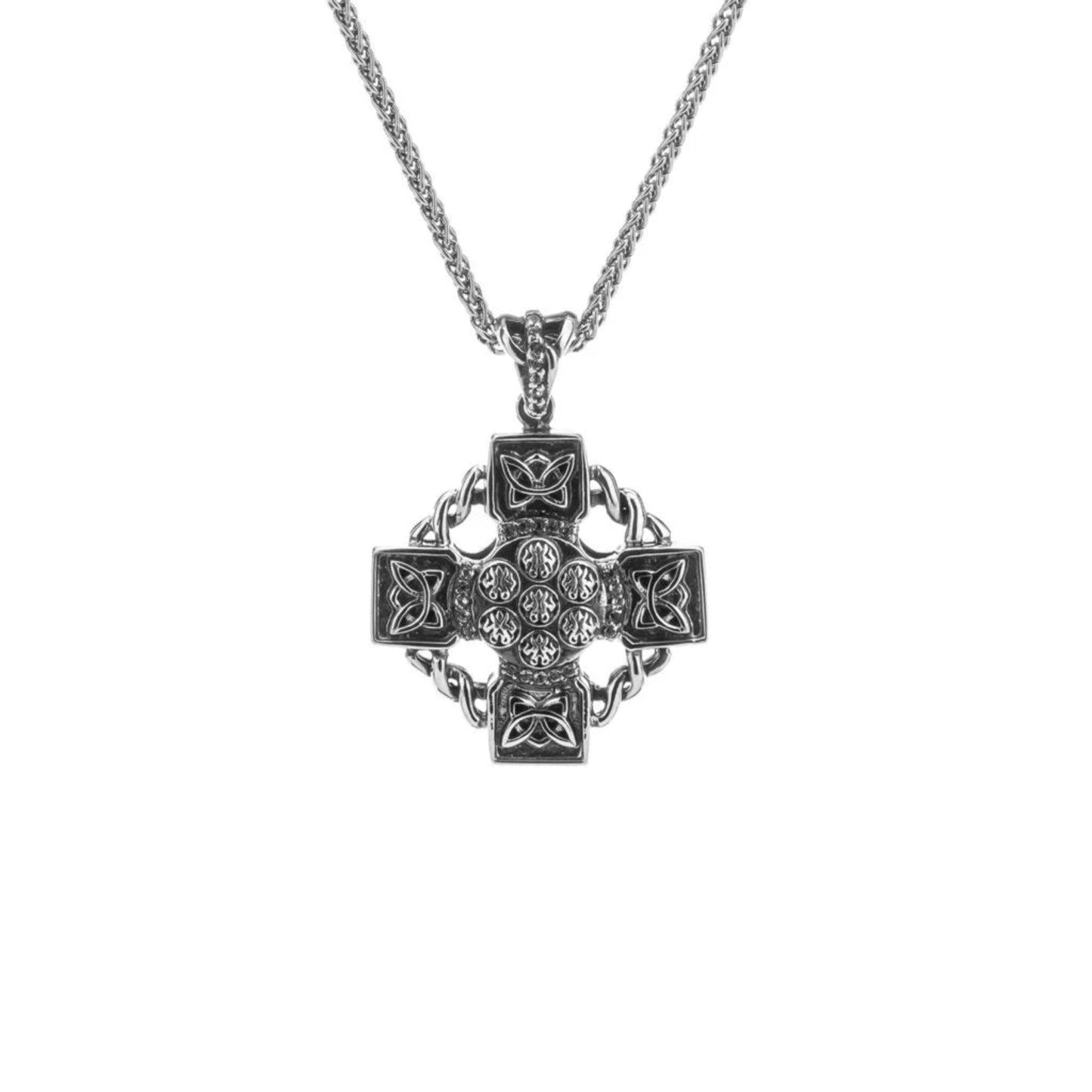 A sterling silver Celtic Wheel Cross pendant with a white topaz in the center, attached to an oxidized medium Spiga style chain.