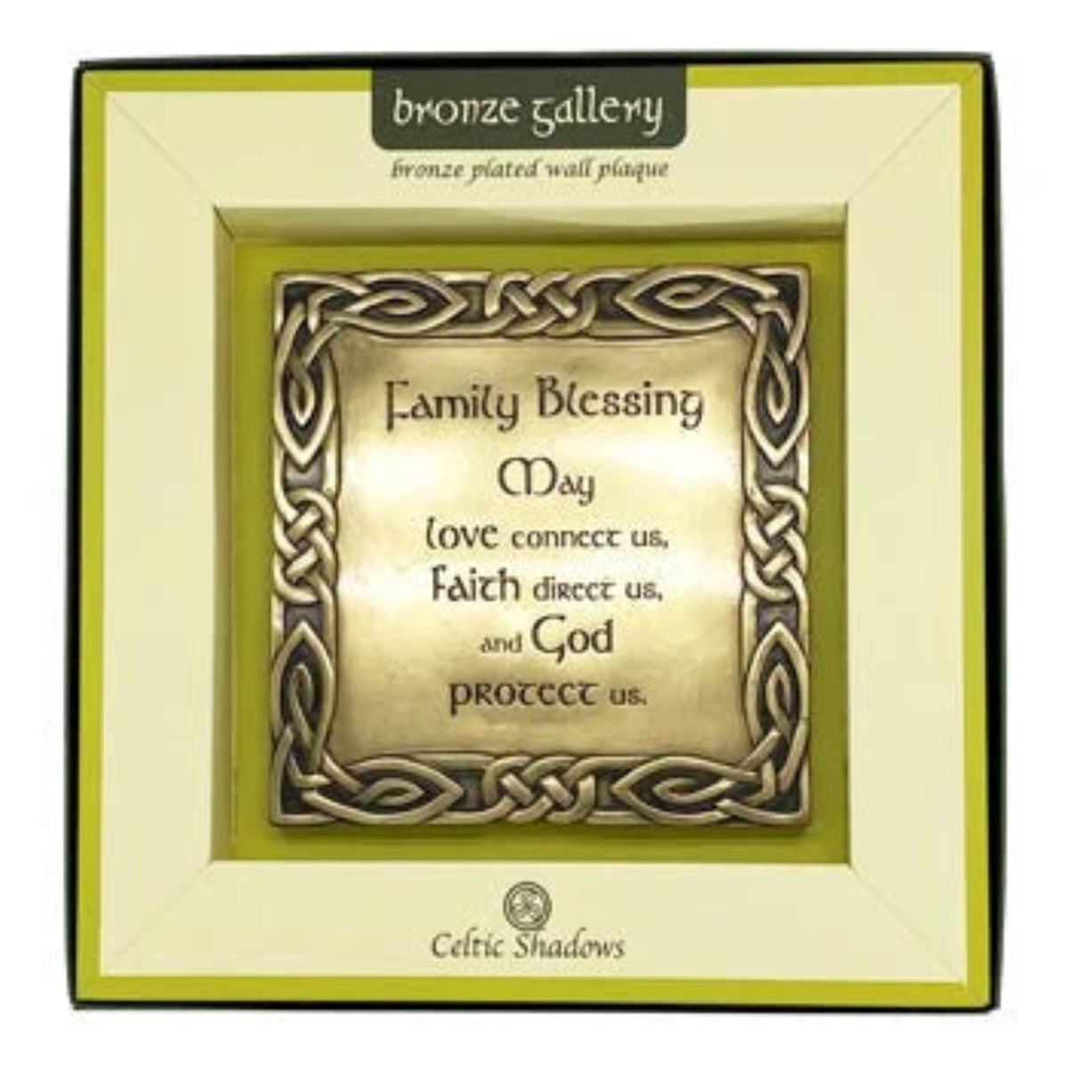 bronze plaque in a decorative white box