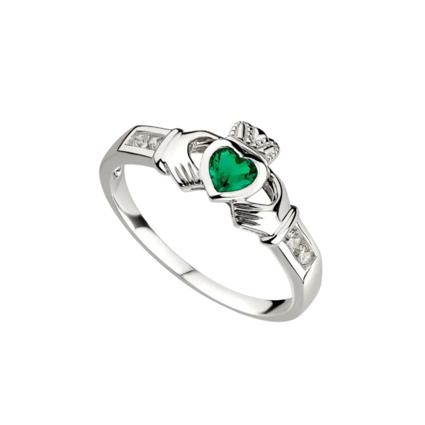 A sterling silver claddagh ring with two hands holding a crowned heart. The central heart is made of green emerald. Each hand's sleeve features two clear white stones.