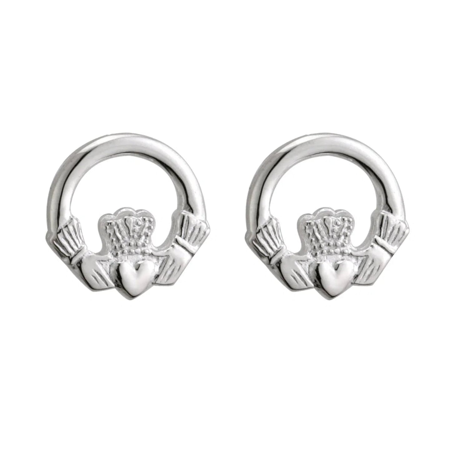 Two small silver earrings in the shape of rounded claddaghs.