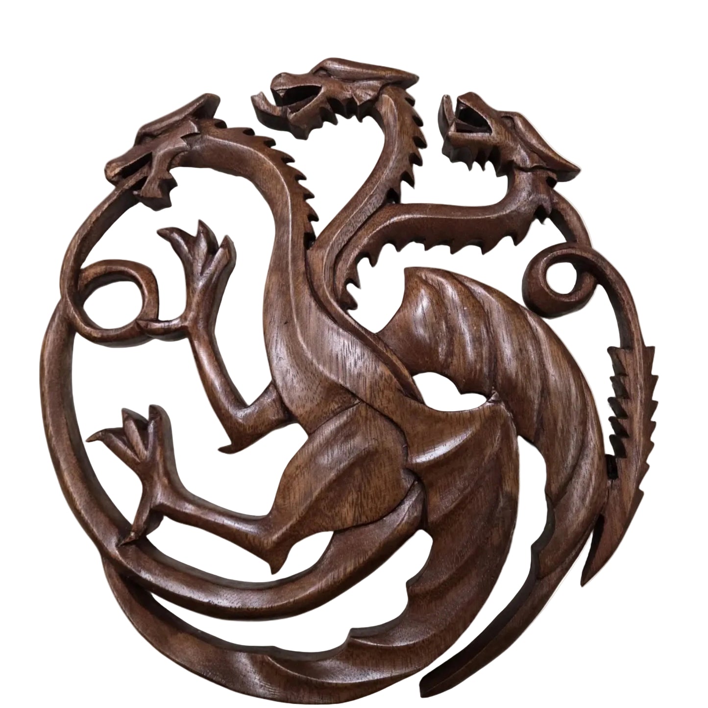 A carved wooden wall art piece depicting a three-headed dragon in a circular composition, finished in a rich dark brown wood tone, shown against a plain off-white background.