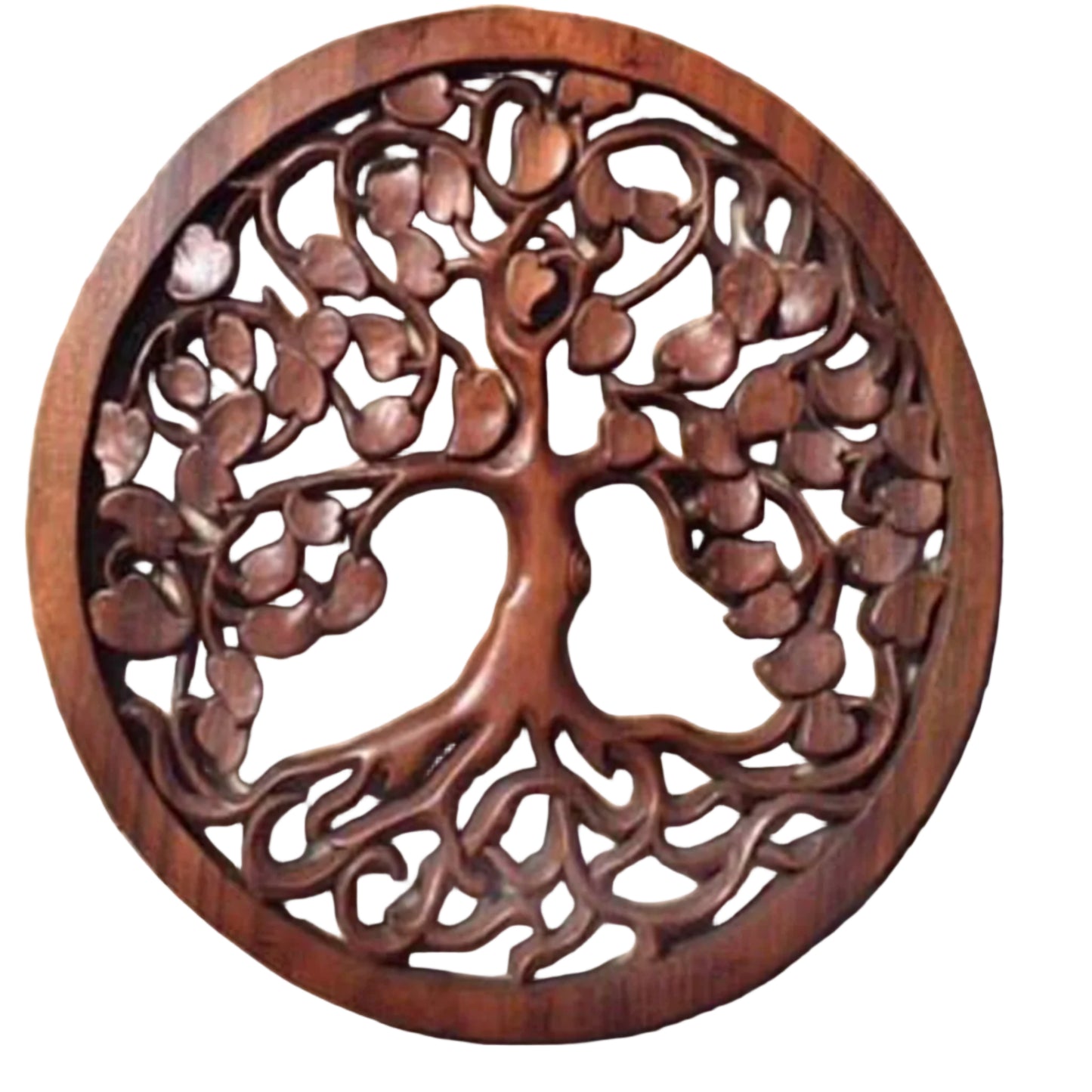 A wooden carving of the Tree of Life with intricate leaf patterns on a circular frame.