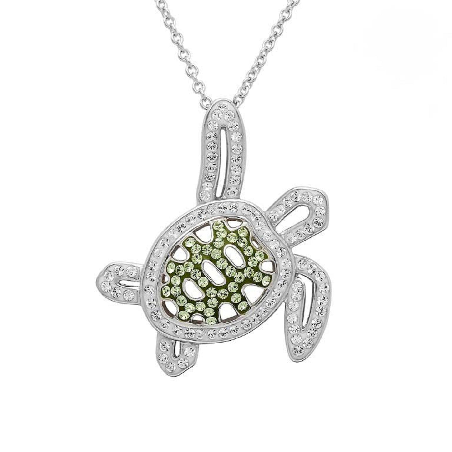 Turtle-shaped pendant with green gemstone and clear stones on a white background