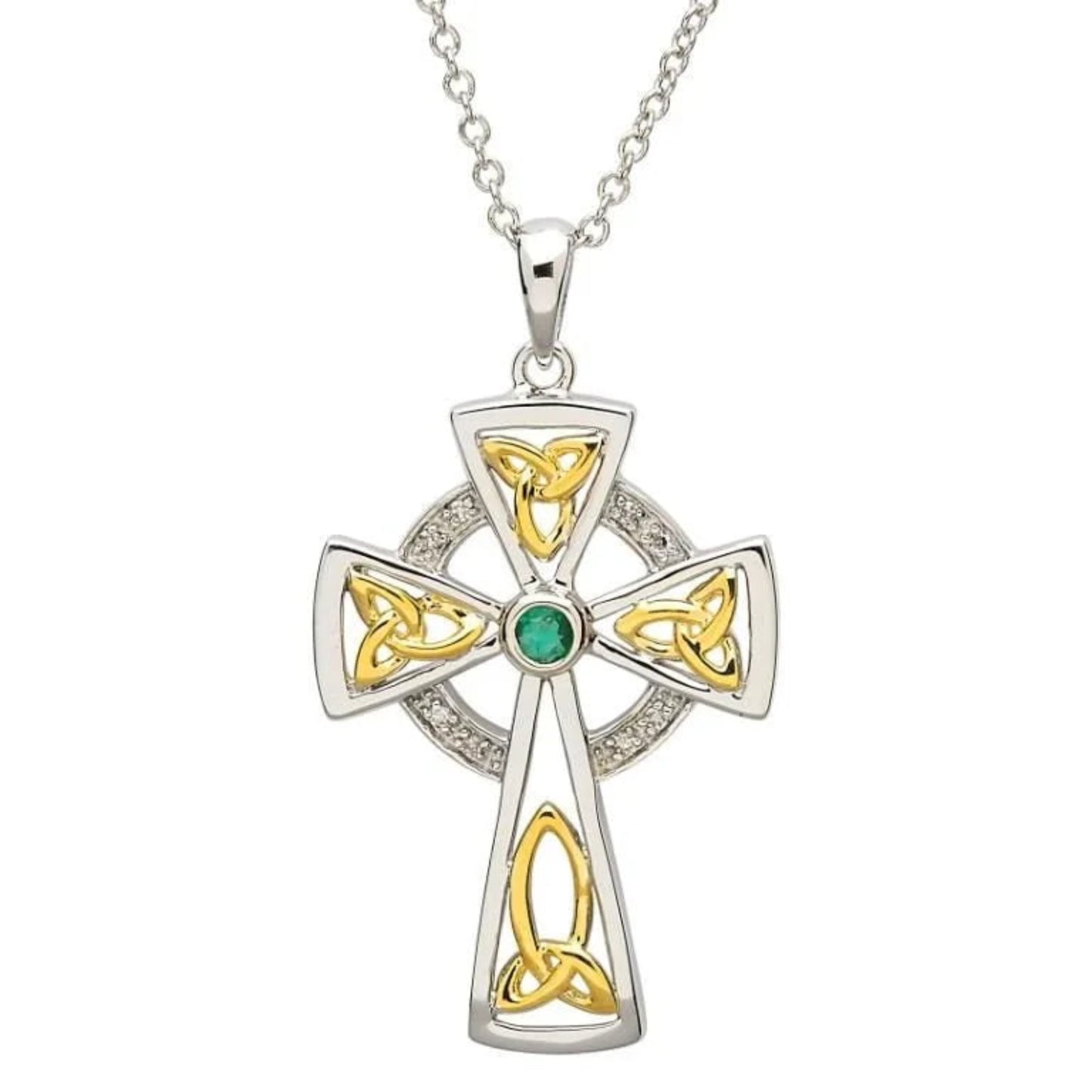 Celtic cross pendant with gold and silver design on a white background