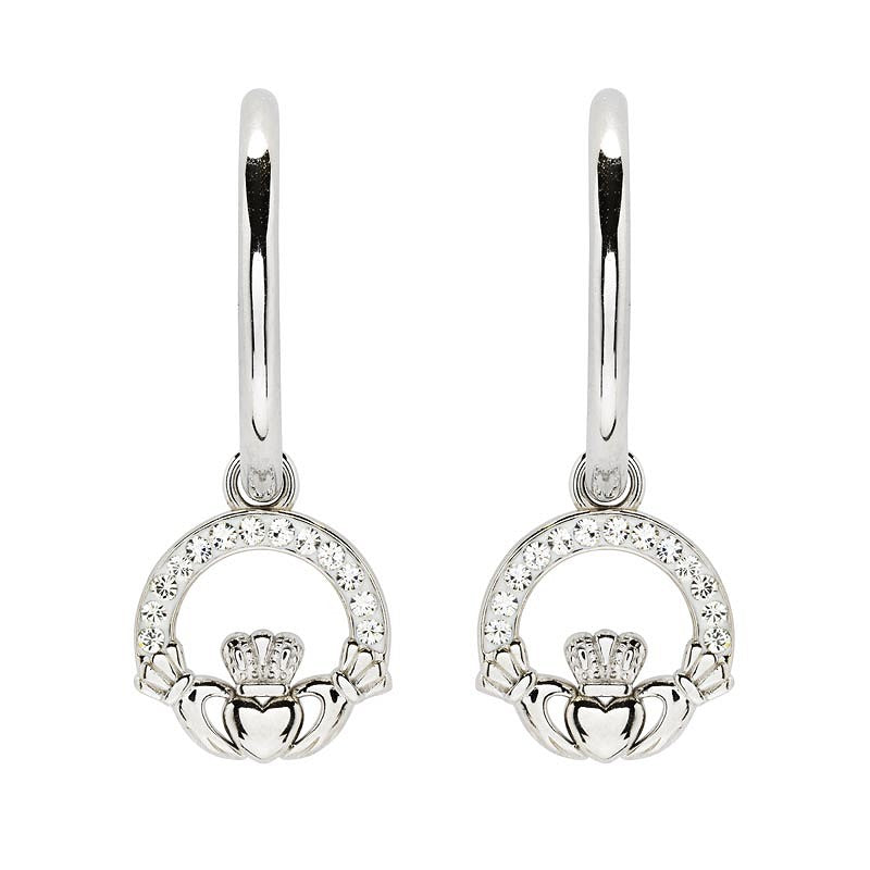A pair of sterling silver hoop earrings with crystal accents and a claddagh design.