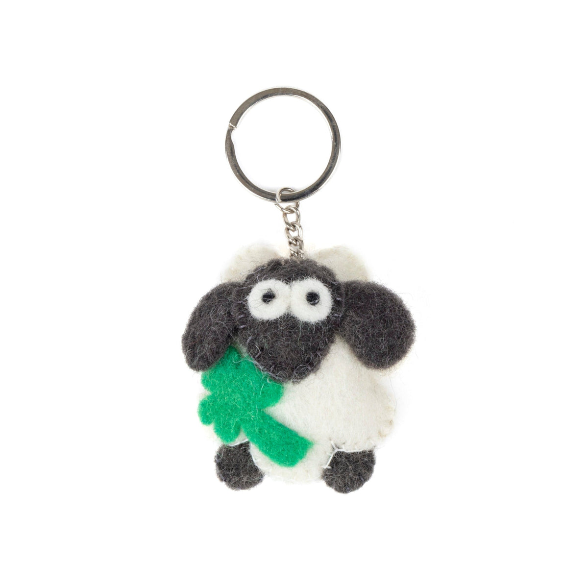 Felt sheep on a keyring holding a green shamrock.