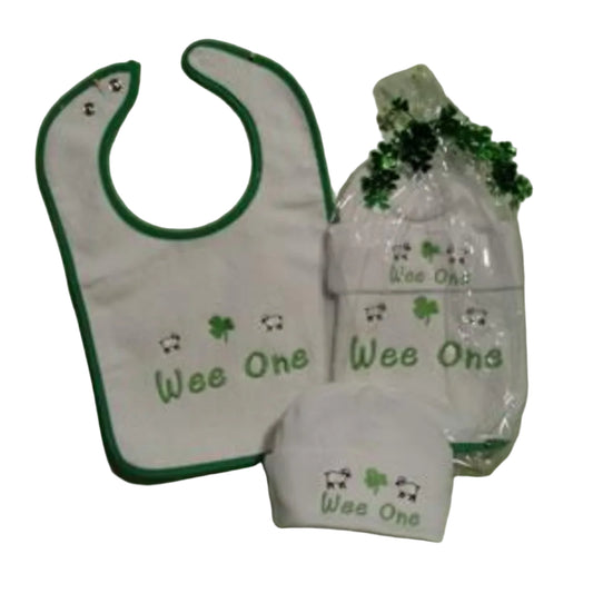 A baby bib and cap gift set with 'Wee One' text and a sheep design, predominantly white with green accents.
