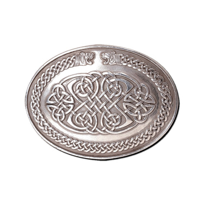 Decorative silver plate with Celtic knot design on a white background