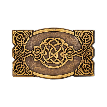 Old brass belt buckle with intricate Celtic knot design on a white background