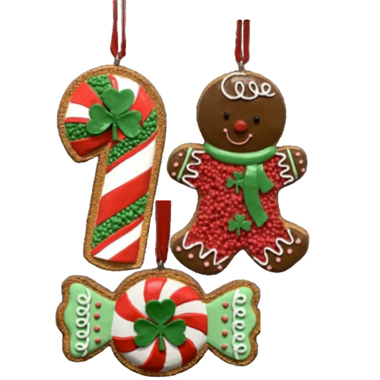 Set of 3 gingerbread celtic design christmas ornaments. One is a gingerbread man, one is a candy cane, and one is a peppermint. 
