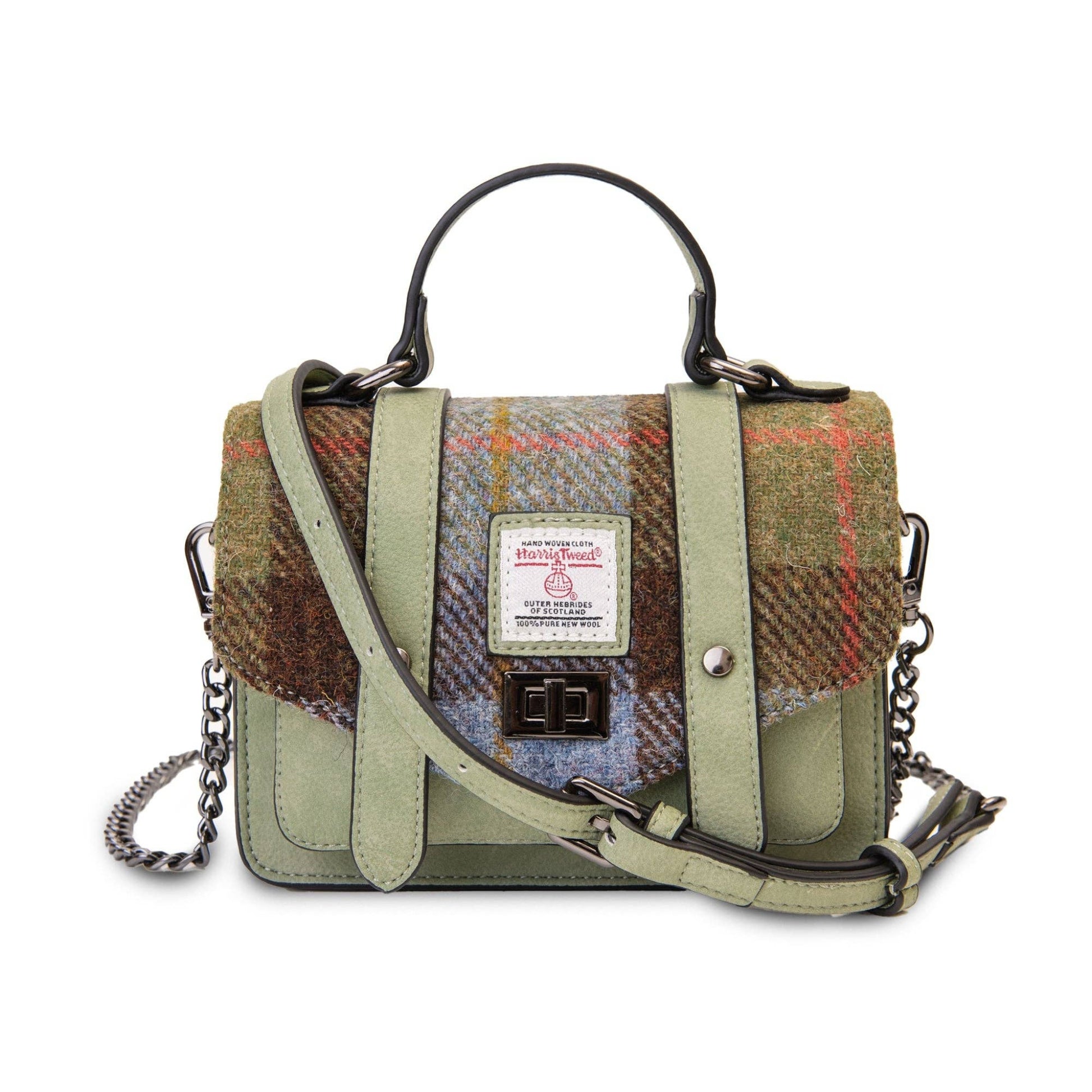 A green microfiber leather handbag with Harris Tweed detailing, featuring a chain strap, a leather handle, and a padlock closure.