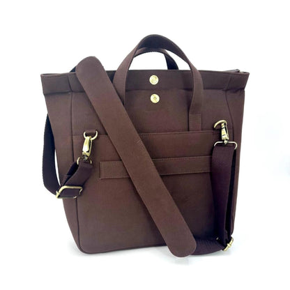 Brown tote bag with a shoulder strap on a white background
