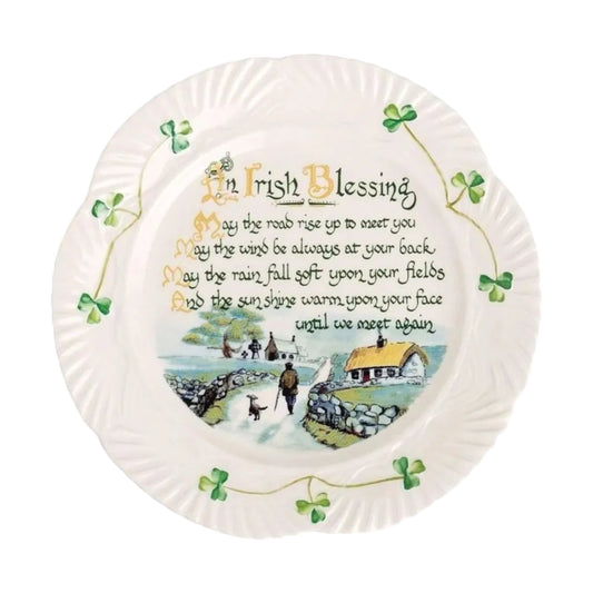 Decorative plate with an Irish blessing and a scenic illustration on a white background