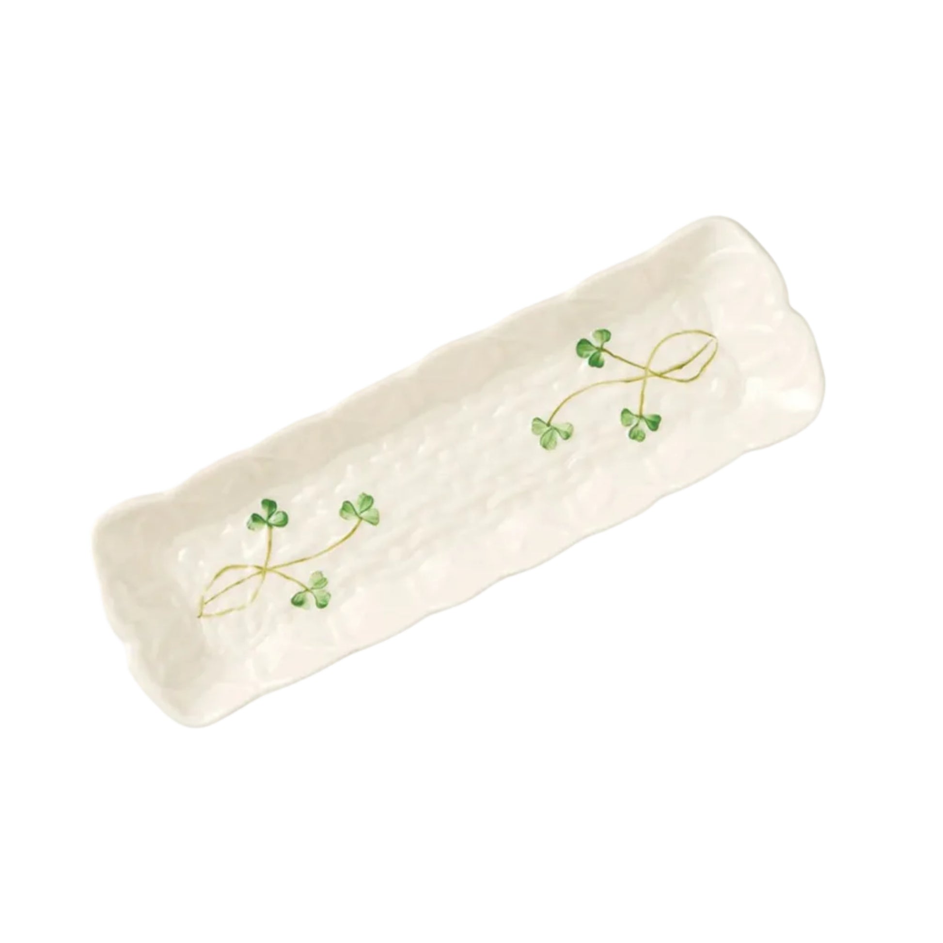 A white decorative tray with a pattern of clover leaves.