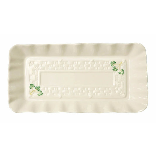 Rectangular ceramic tray with decorative elements on a white background