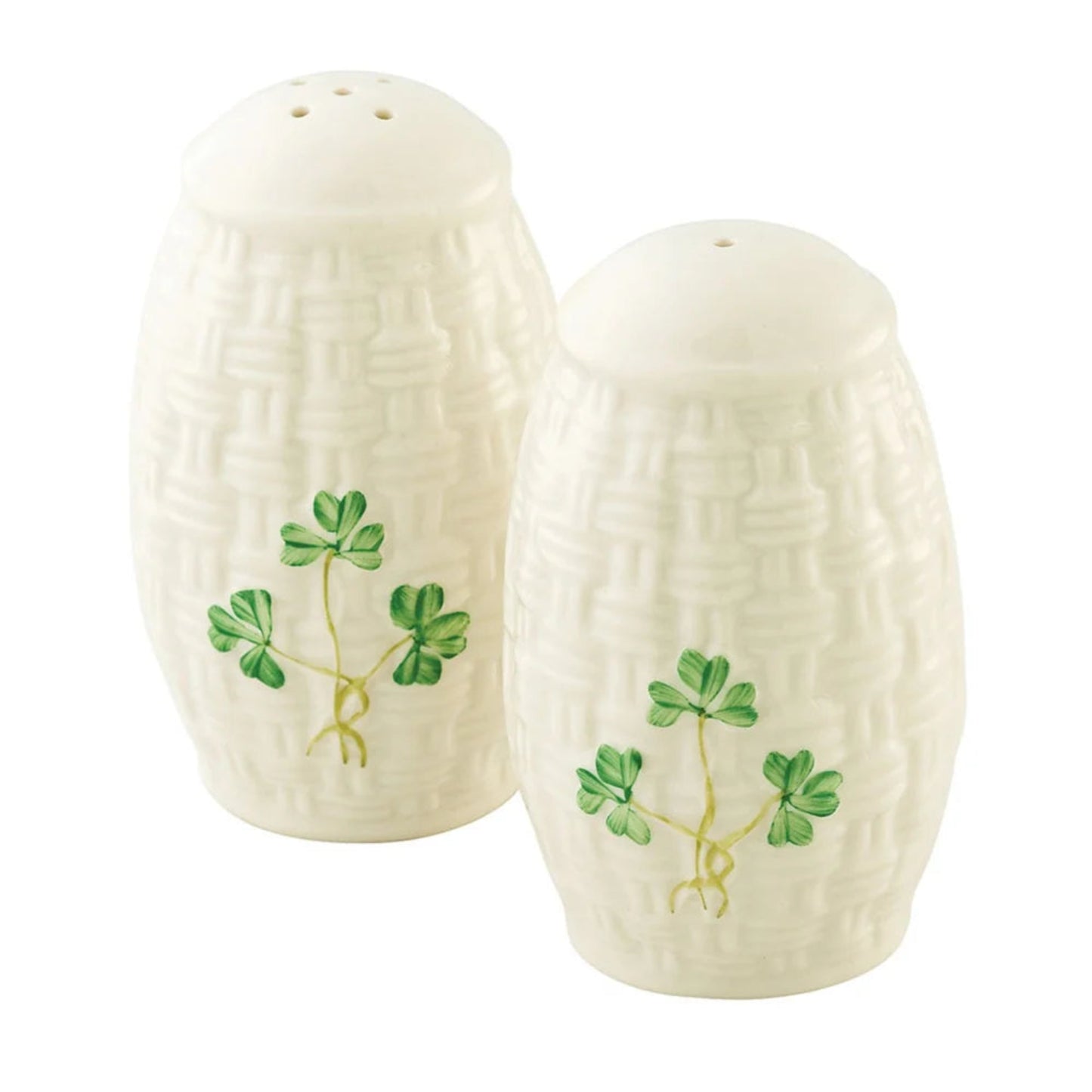 Two ceramic salt and pepper shakers with clover designs on a white background