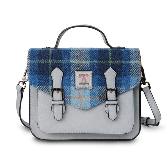 Plaid bag with a blue flap on a white background