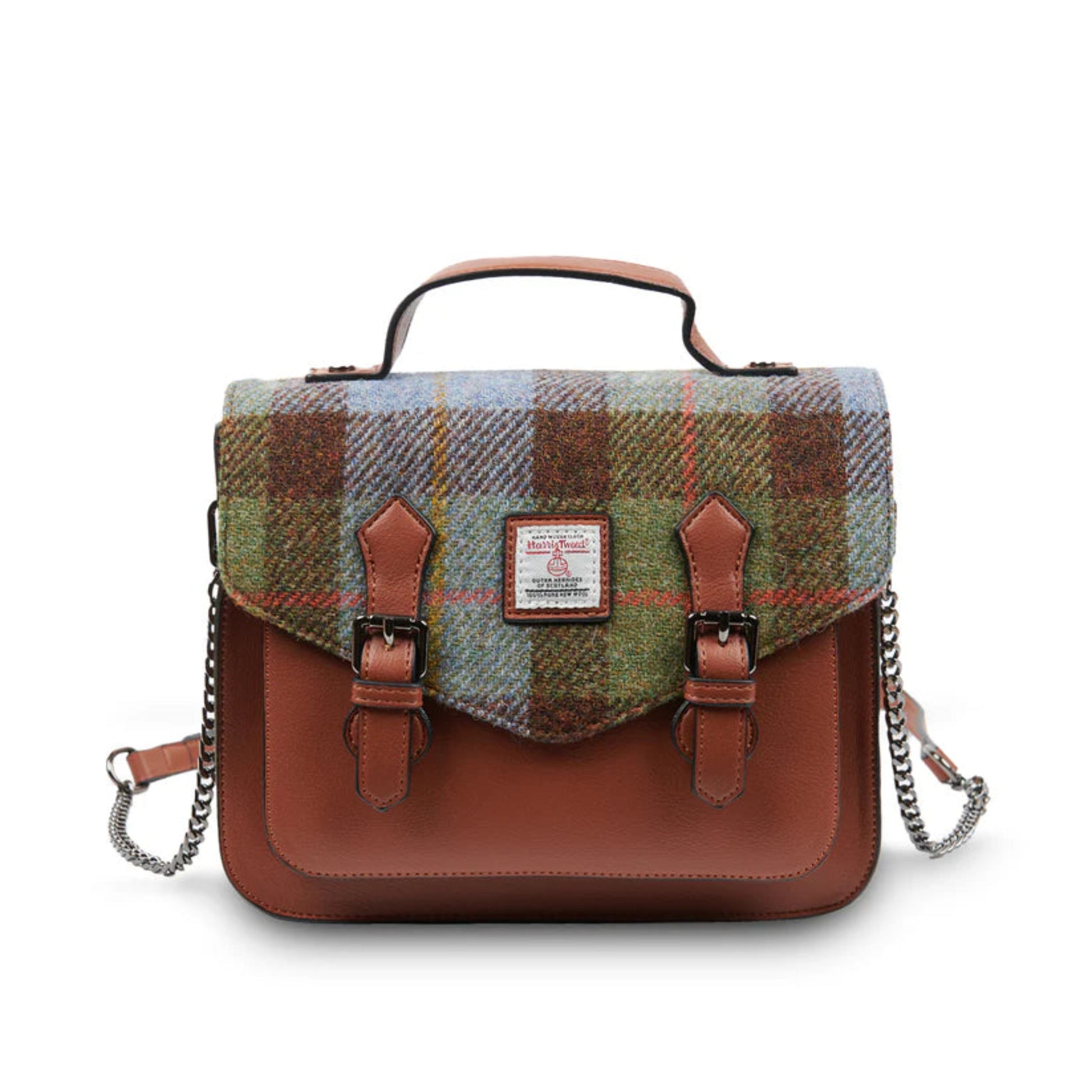 Plaid bag with brown leather accents on a white background