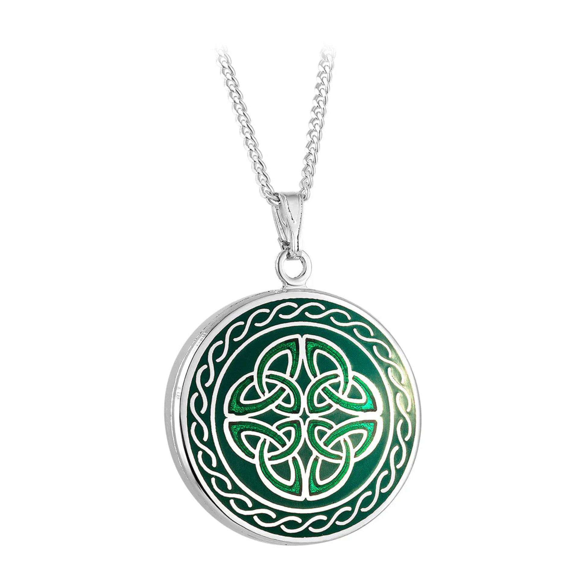 A silver-colored necklace with a round green enamel pendant. Has a celtic knot design.