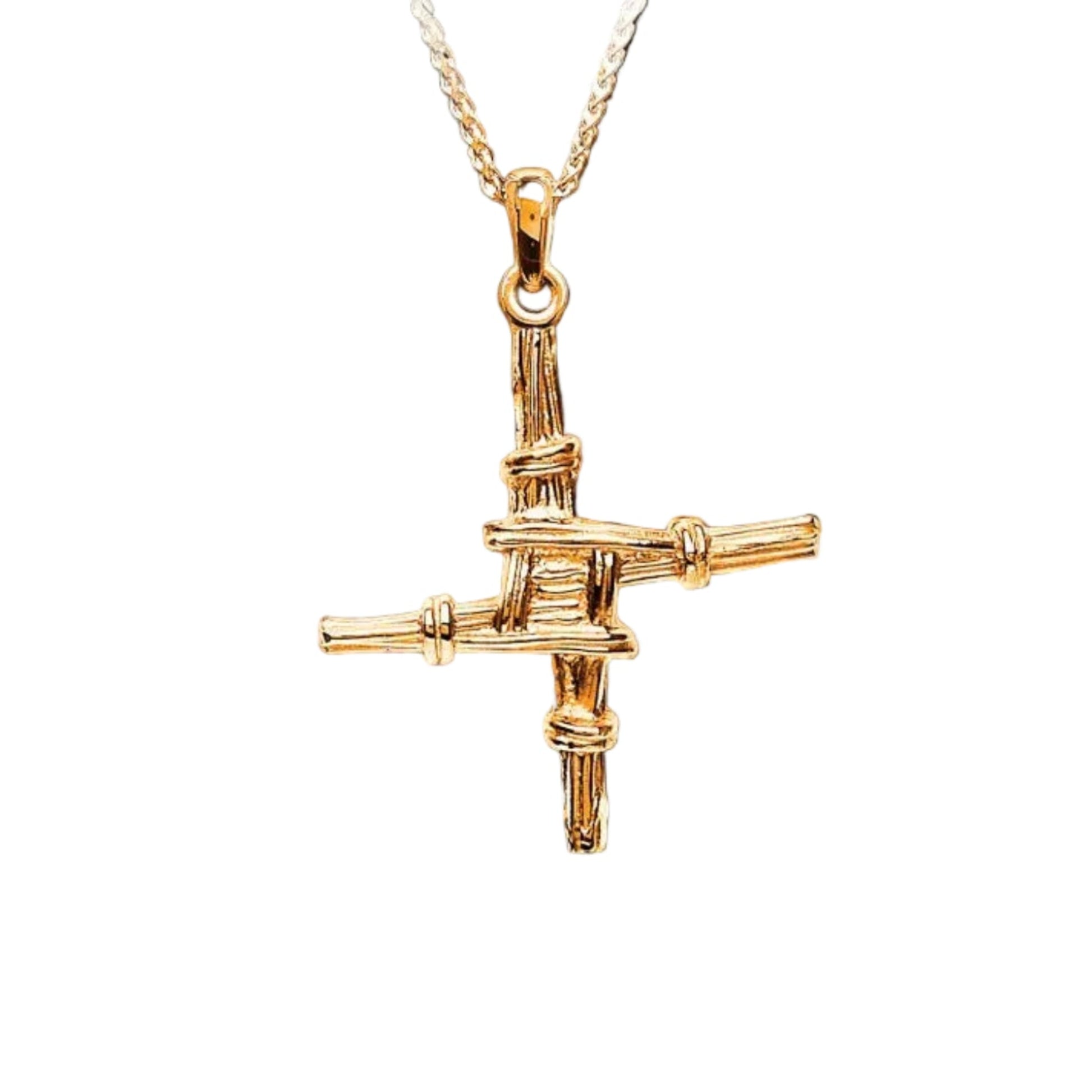 Golden St. Brigid's cross detailed pendant on a chain necklace.