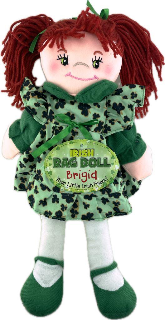 A doll with red hair, wearing a green and white dress and green and white striped shoes, with a tag showing the name 'Eileen'.