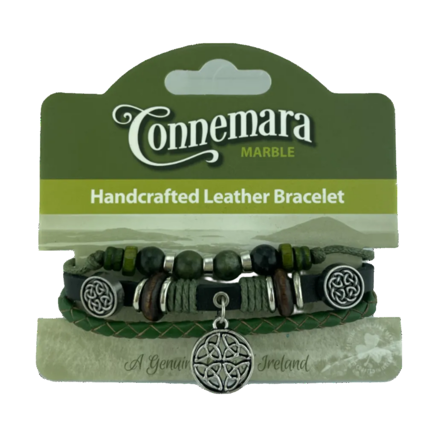 Handcrafted leather bracelet with beads and Celtic charm on Connemara Marble packaging.
