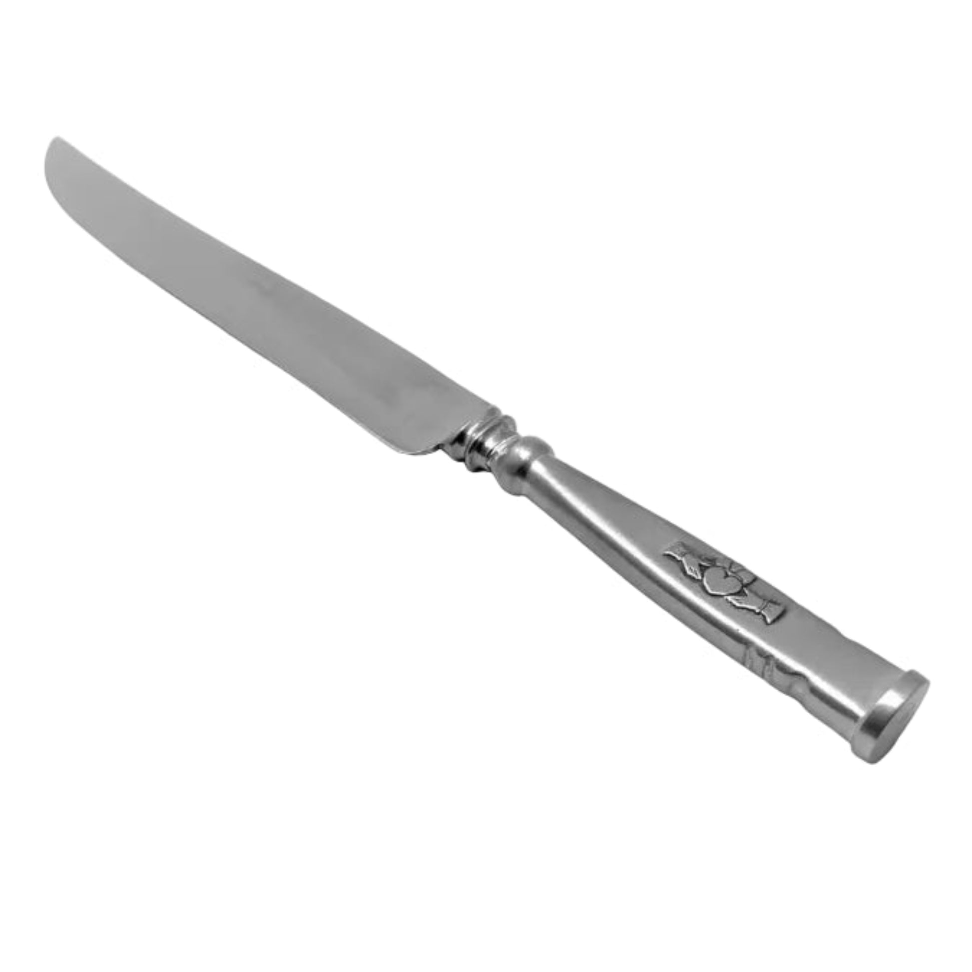 Silver knife with a decorative claddagh emblem on the handle on a white background