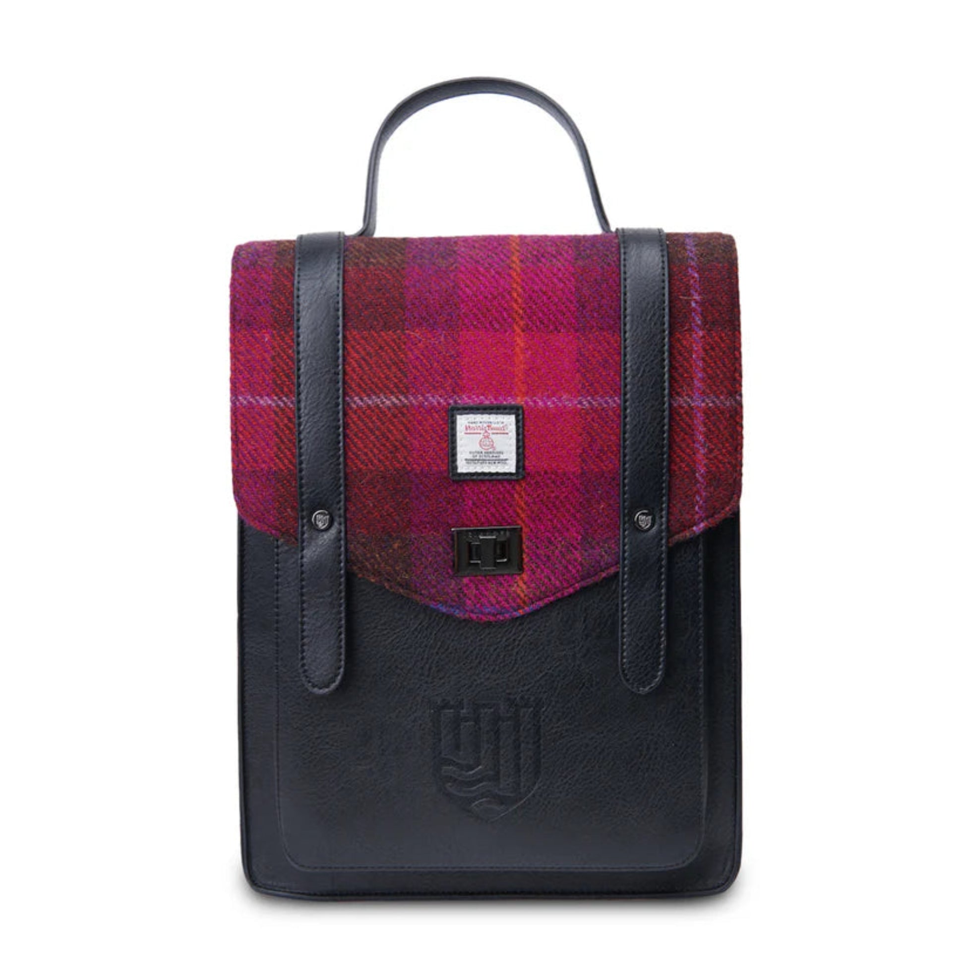 Backpack with plaid pattern on top and black leather sides on a white background