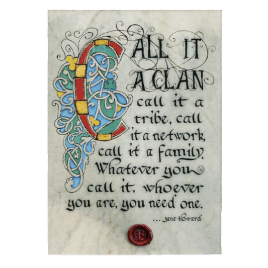A tan Celtic manuscript print with colorful calligraphy and a red stamp.