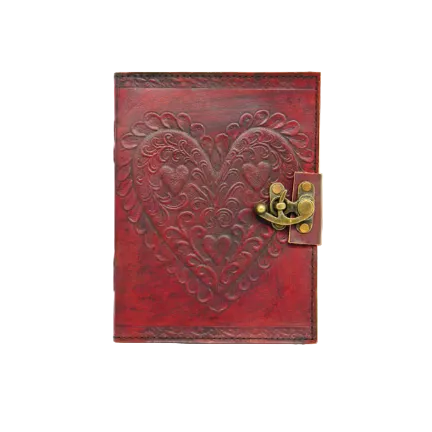 A red leather journal with embossed heart pattern and a metal lock