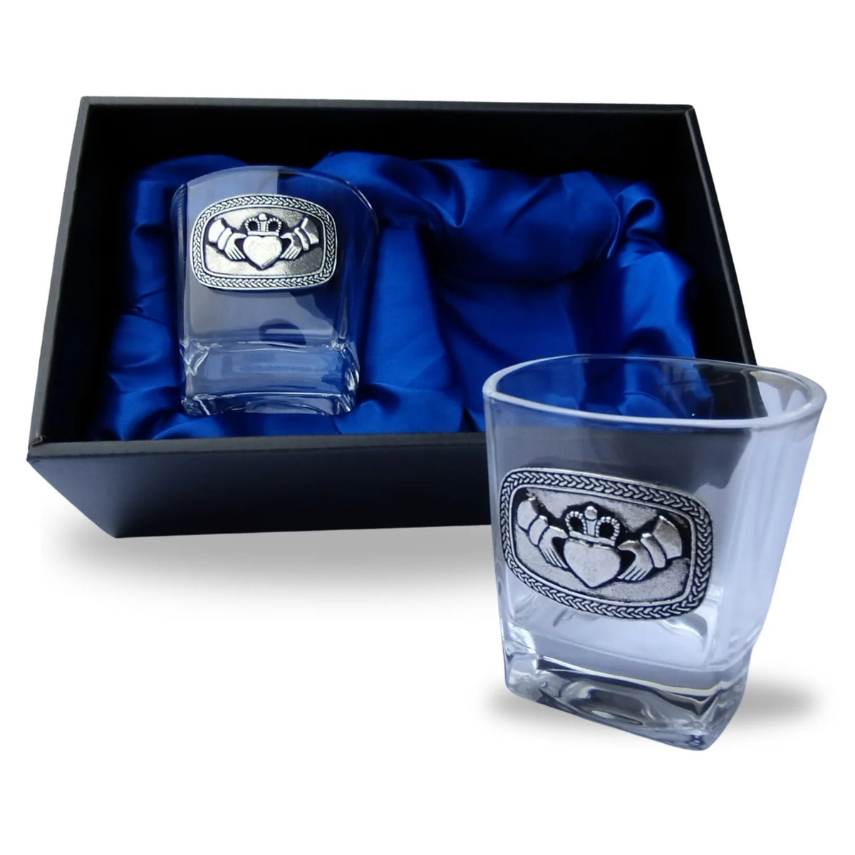 Two crystal whiskey glasses with claddagh design in a black box lined with blue satin