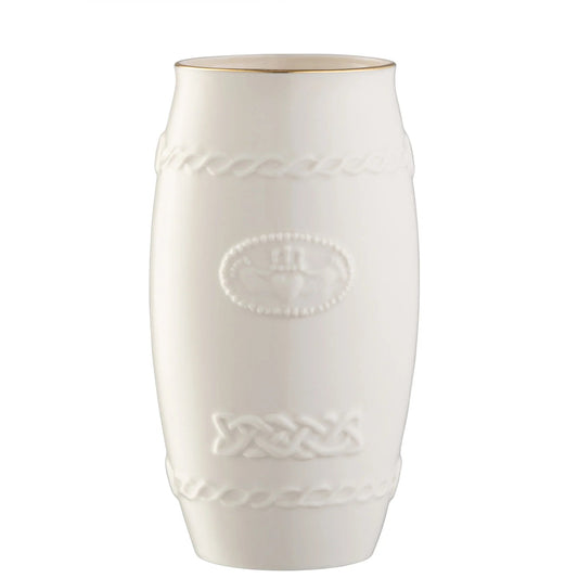 White porcelain vase with embossed claddagh and a gold rim. 