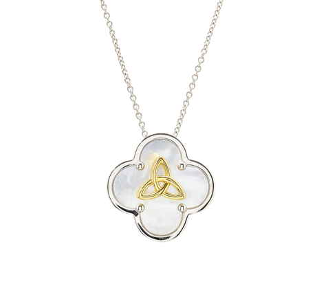 A silver-toned clover pendant necklace featuring a white mother-of-pearl inlay and a gold-toned triquetra knot in the center, suspended from a delicate silver chain against a plain white background.