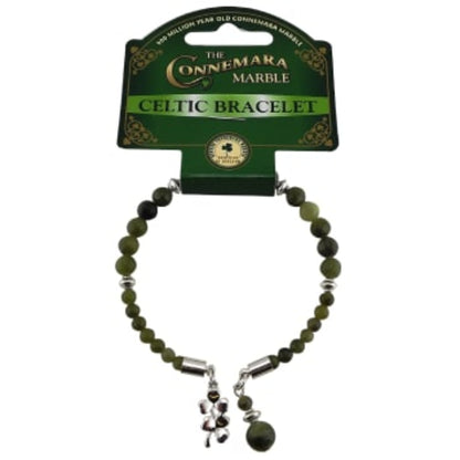 Green beaded bracelet with silver accents on a Connemara Marble branded card.