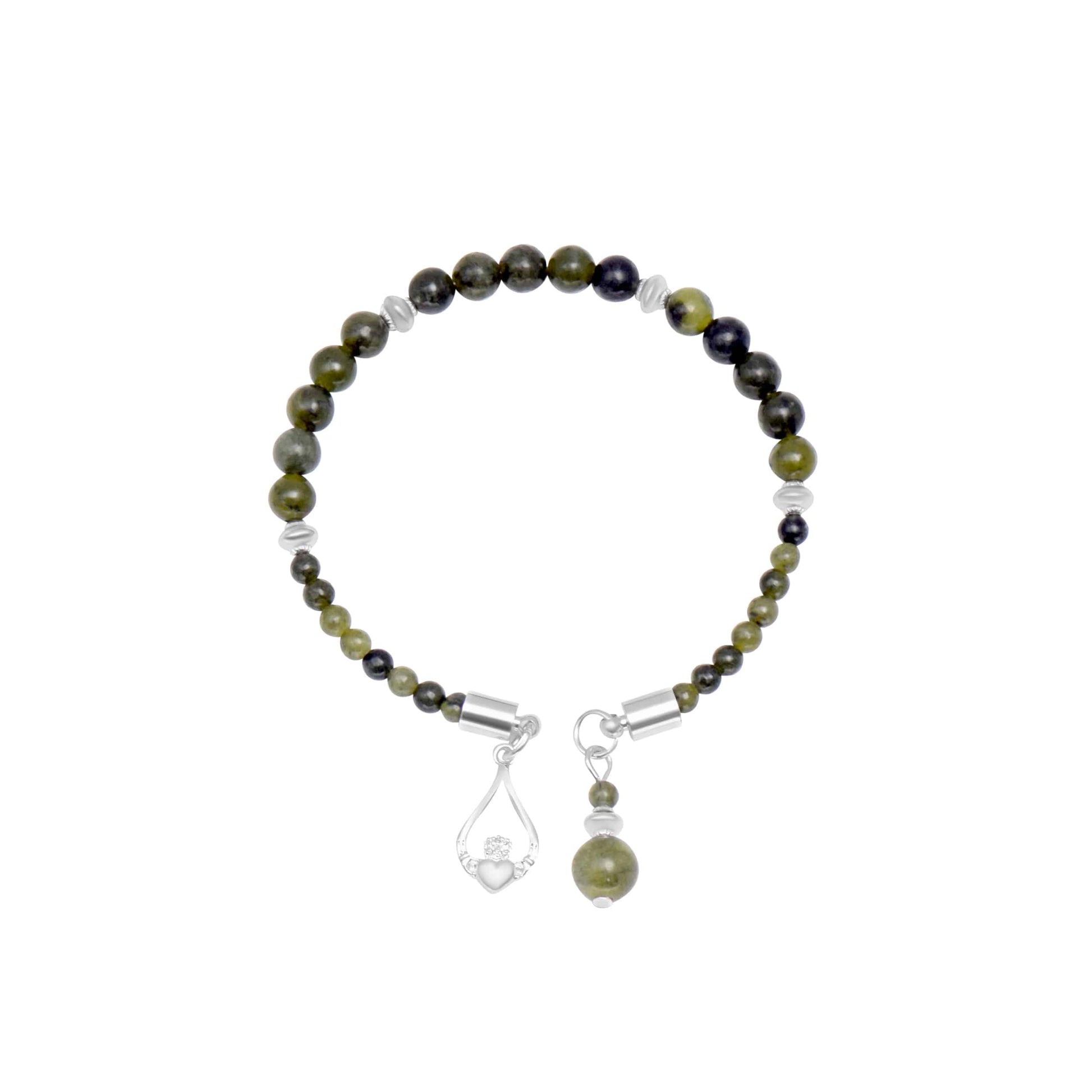 Beaded bracelet with green and black stones on a white background