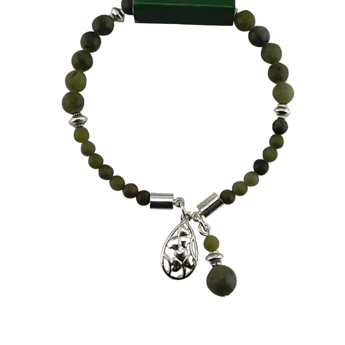 Green Connemara marble bracelet with silver charm on a green Connemara Marble branded card.