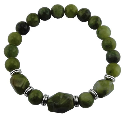 Green beaded bracelet with silver accents on a white background