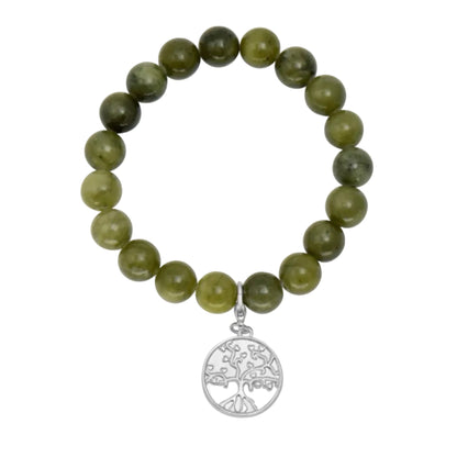 Green beaded bracelet with a silver tree of life pendant on a white background