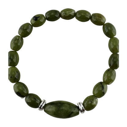 Green beaded bracelet with silver accents on a white background