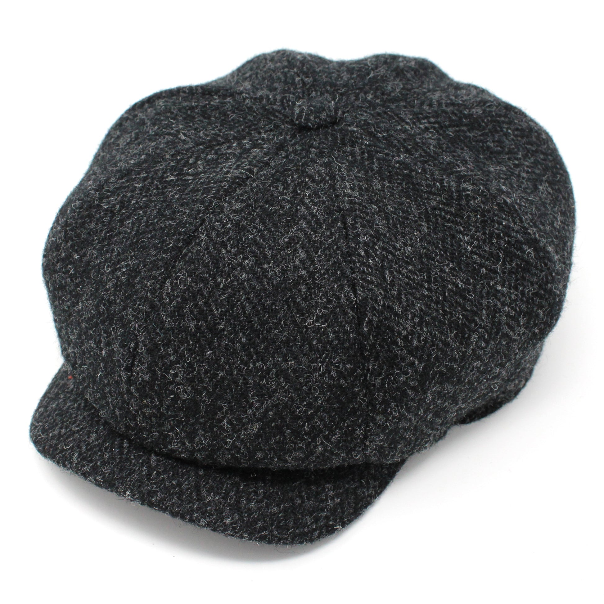 Dark gray newsboy cap on a white background