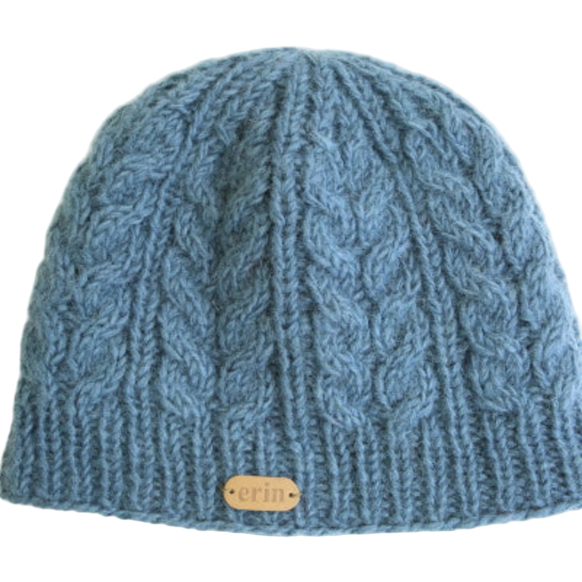 Blue knit beanie with a small wooden tag