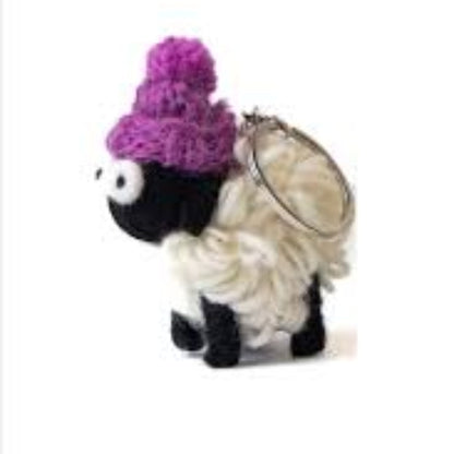 Sheep keyring with purple knit bobble hat